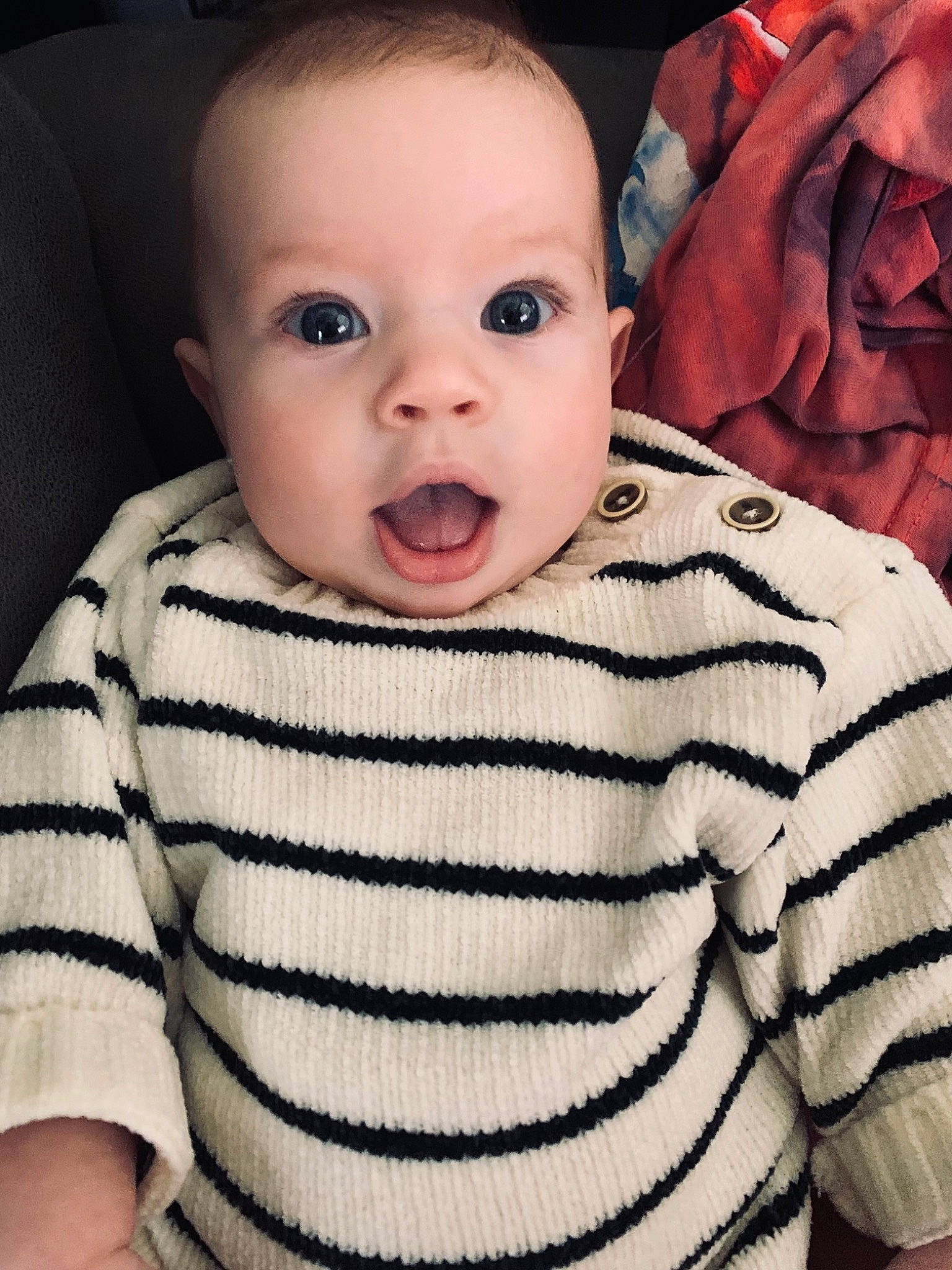 Blake is registered to the contest to win money with this photo: baby, baby_toddler_clothing, cheek, chin, collar, comfort, cool, eye, eyebrow, eyelash, flash_photography, happy, iris, lip, mouth, neck, nose, person, skin, sleeve