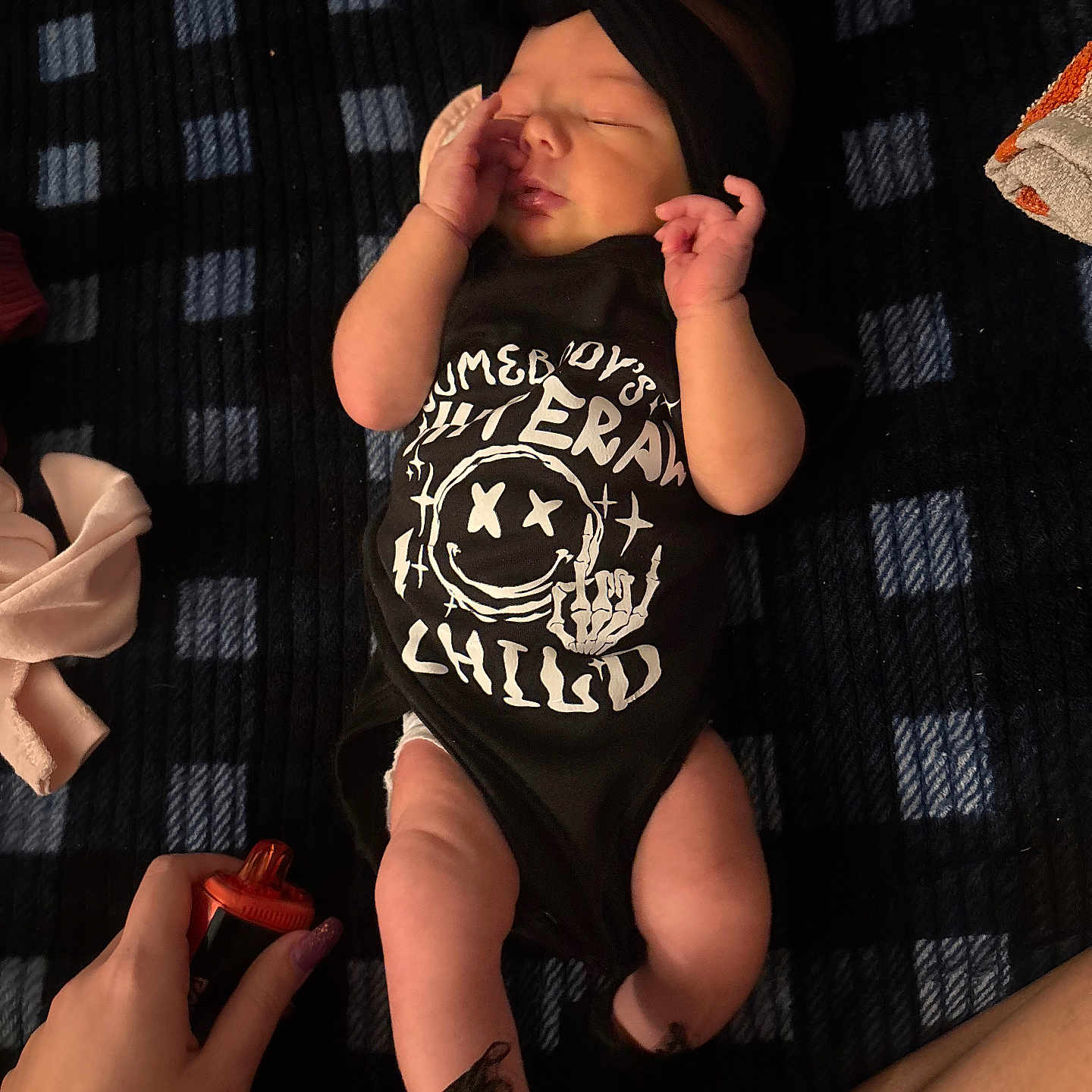 Cheryl is registered to the contest to win money with this photo: baby, bodypart, bottle, clothing, cosmetics, couch, face, finger, footwear, furniture, hand, head, newborn, perfume, person, photography, portrait, shorts, sleeping, t_shirt