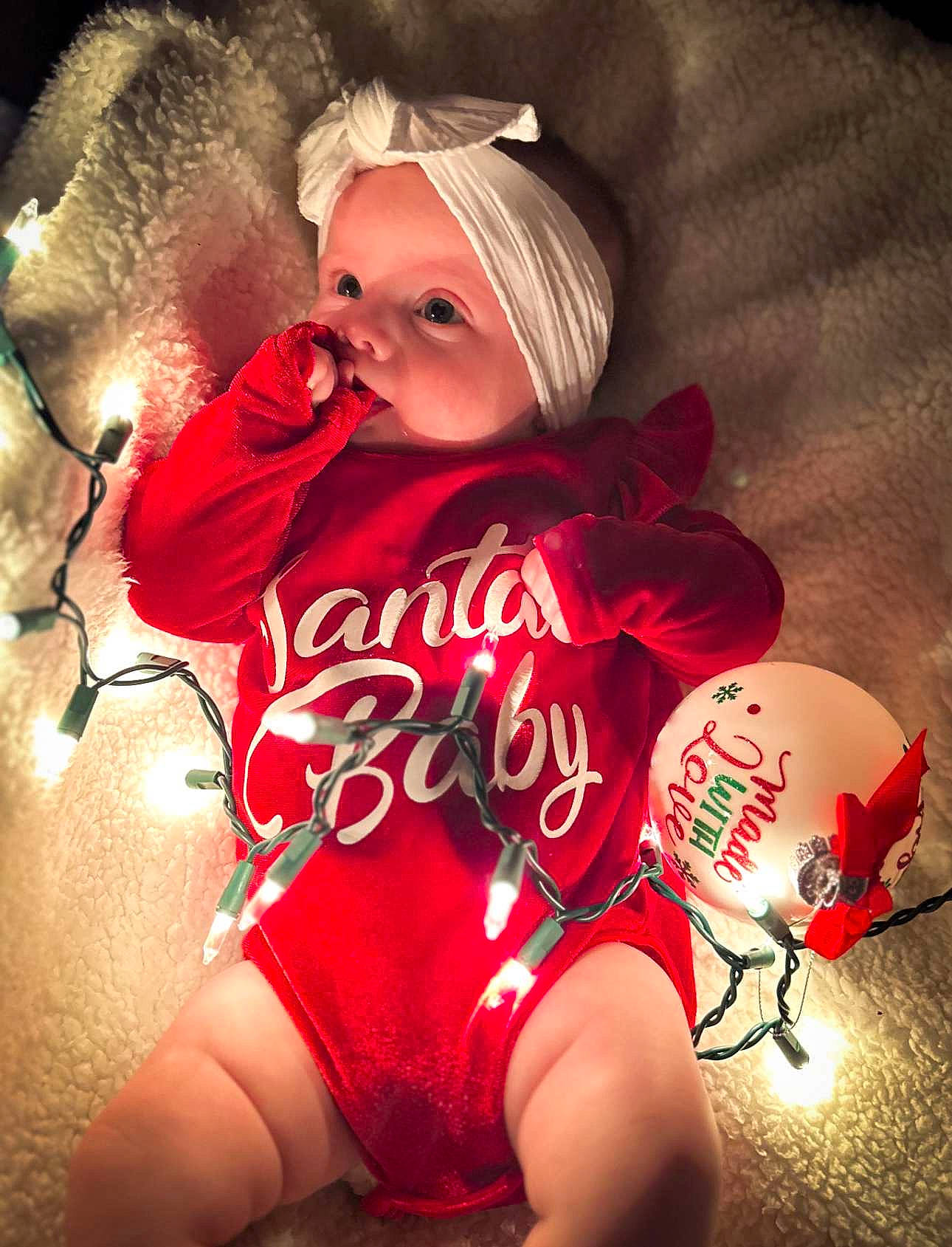 Harper is registered to the contest to win money with this photo: abdomen, baby, baby_toddler_clothing, cap, child, eye, fun, happy, headgear, headwear, holiday, human_leg, jersey, knee, leg, person, pink, sleeve, sportswear, thigh