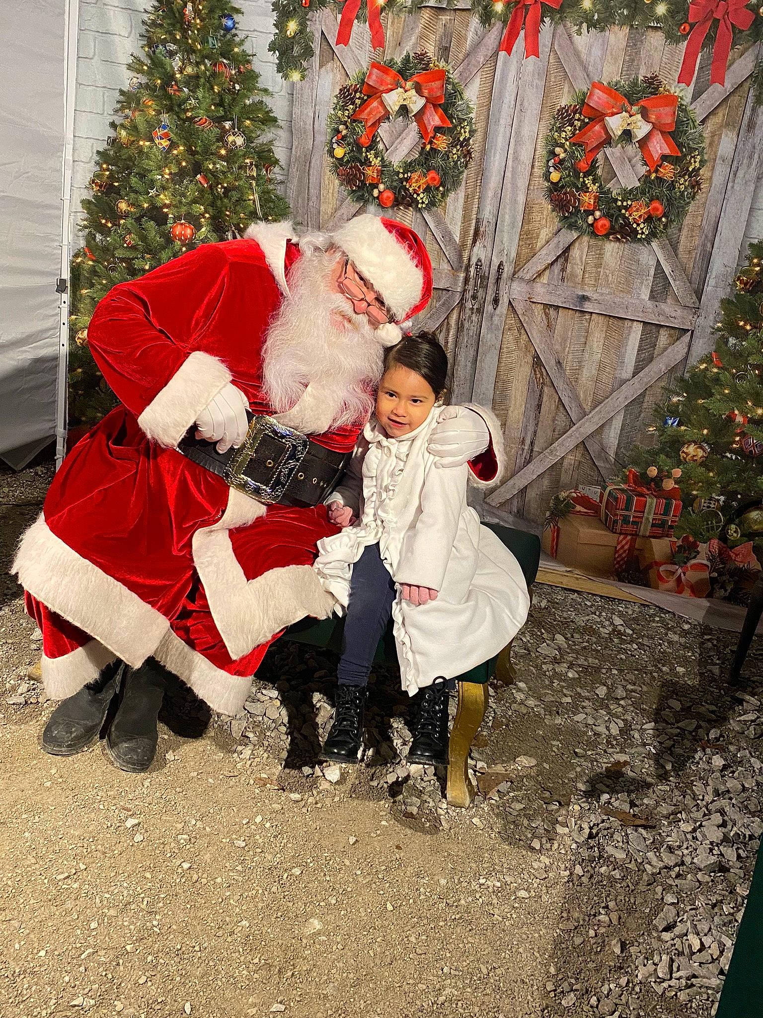 Anaiyah is registered to the contest to win money with this photo: baby, boot, christmas, christmas_decoration, christmas_eve, christmas_ornament, christmas_tree, event, fictional_character, fun, happy, hat, holiday, lap, people_in_nature, person, plant, santa_claus, smile, toddler