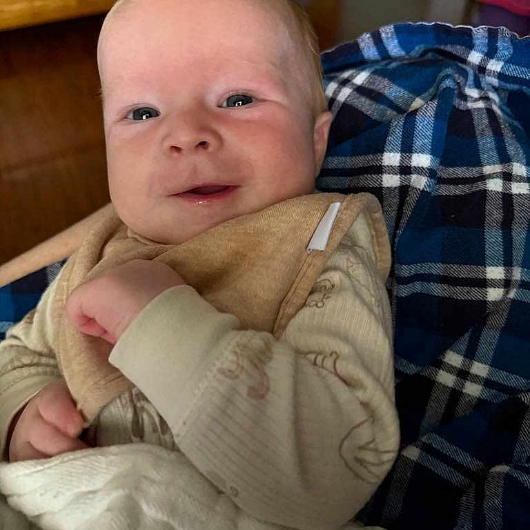 Burley joined the competition — help win amazing prizes! baby, blanket, blonde, cushion, face, hair, head, homedecor, newborn, person, photography, portrait, quilt, sad, sleeping