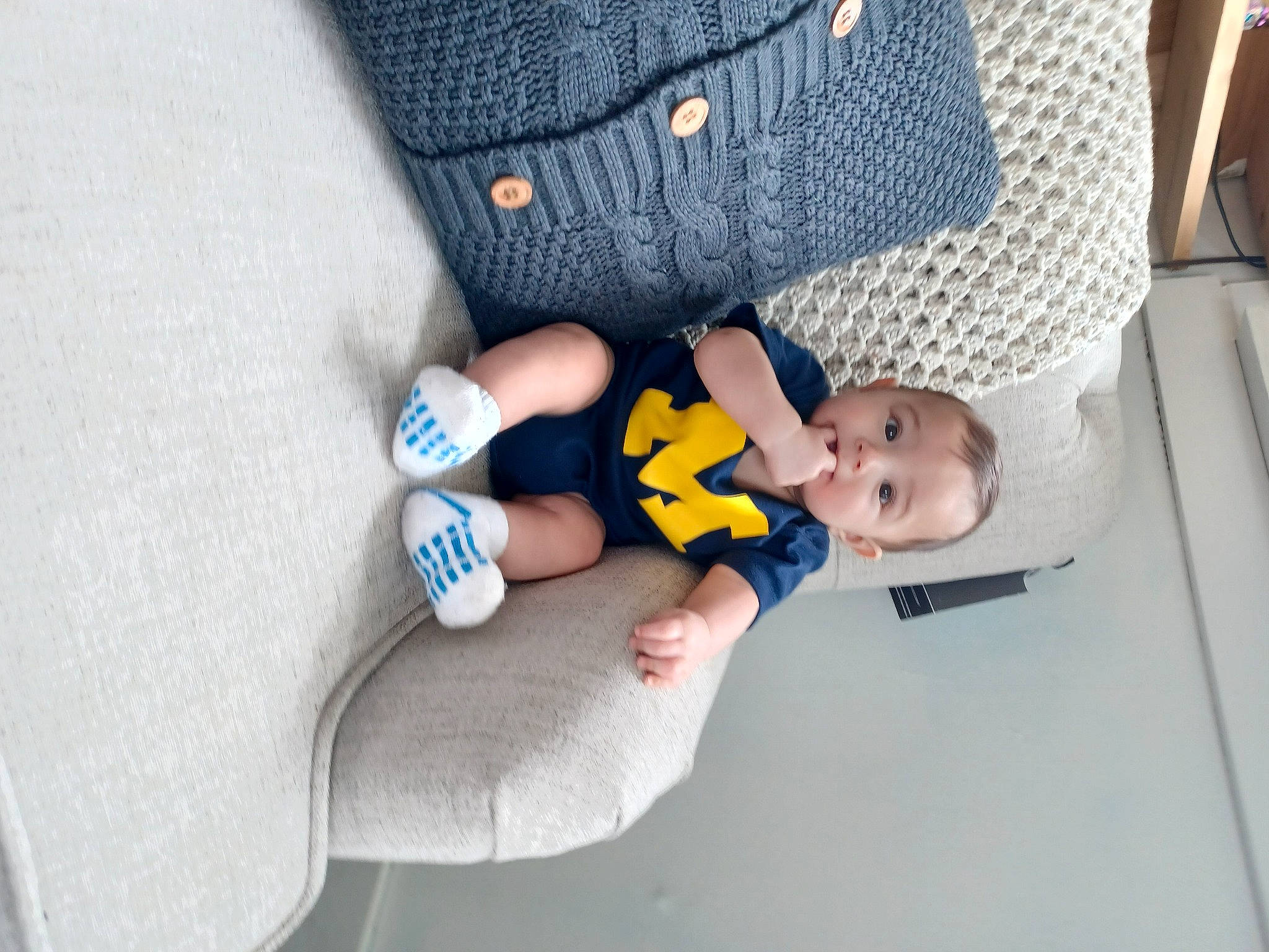 Ezekiel joined the competition — help win amazing prizes! baby, baby_products, baby_toddler_clothing, car_seat, child, comfort, electric_blue, finger, human_body, human_leg, knee, leg, linens, nail, person, sitting, sleeve, t_shirt, textile, thumb