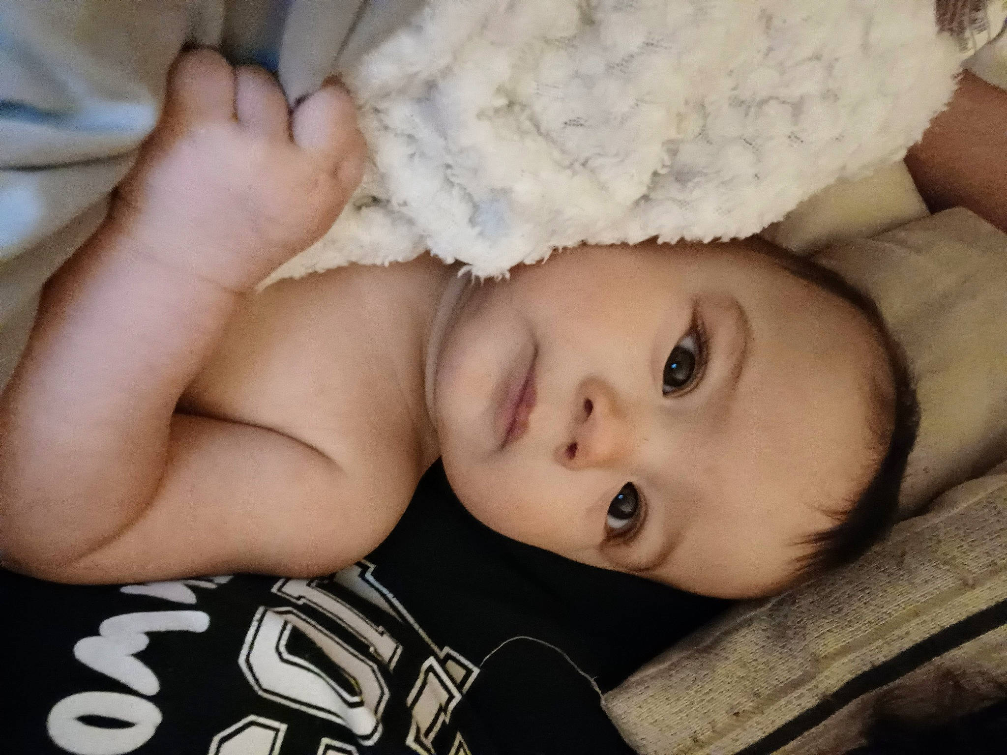 Ezekiel is registered to the contest to win money with this photo: baby, baby_sleeping, cheek, chin, comfort, eye, eyebrow, eyelash, face, finger, flash_photography, hand, head, headgear, iris, lip, mouth, nose, person, skin