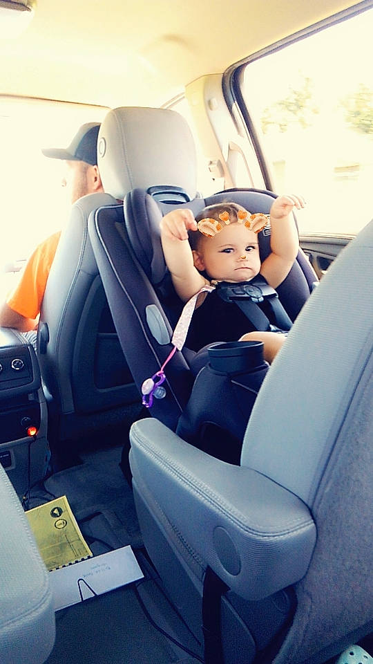 Elliana is registered to the contest to win money with this photo: air_travel, auto_part, automotive_design, automotive_exterior, automotive_lighting, car_seat, car_seat_cover, comfort, electric_blue, family_car, head_restraint, headwear, mode_of_transport, motor_vehicle, passenger, person, personal_luxury_car, seat_belt, toddler, toy