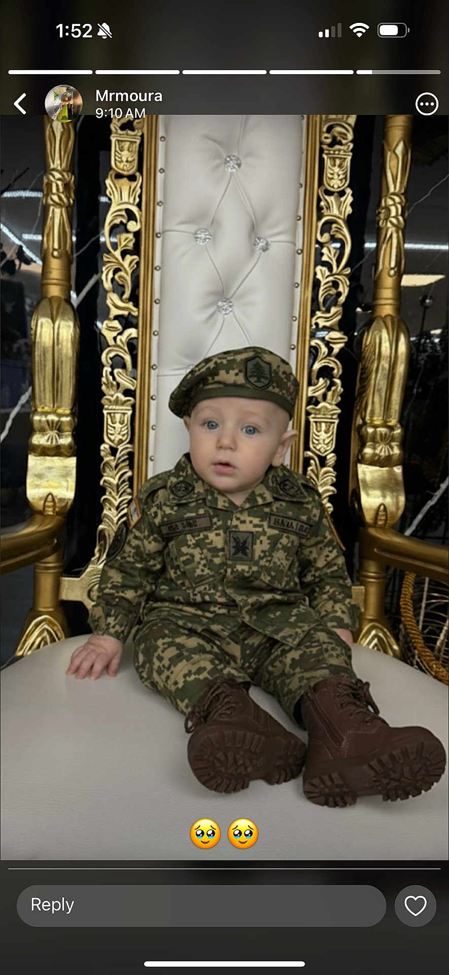 Amir joined the competition — help win amazing prizes! baby, child, military_uniform, camouflage, boots, chair, throne, golden, white_cushion, blue_eyes, indoor, portrait, person, cute, sitting, face, hat, expression, decor, young_child
