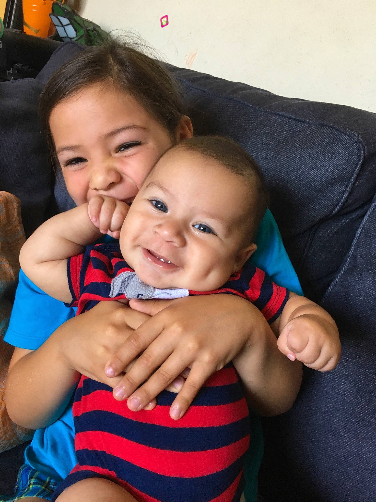 Matheo joined the competition — help win amazing prizes! arm, baby, cheek, child, face, facial_expression, finger, fun, happy, head, hug, interaction, joy, leg, lip, mother, nose, person, skin, smile