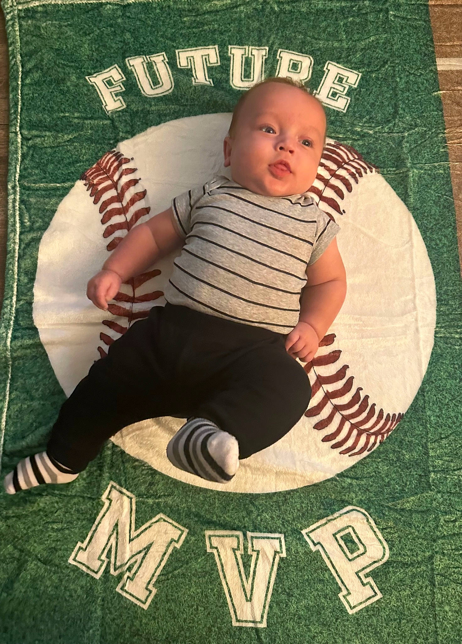 Ayden joined the competition — help win amazing prizes! baby, baby_products, baby_toddler_clothing, chair, child, flooring, font, grass, happy, illustration, lap, linens, pattern, person, product, rectangle, sitting, sleeve, sock, t_shirt