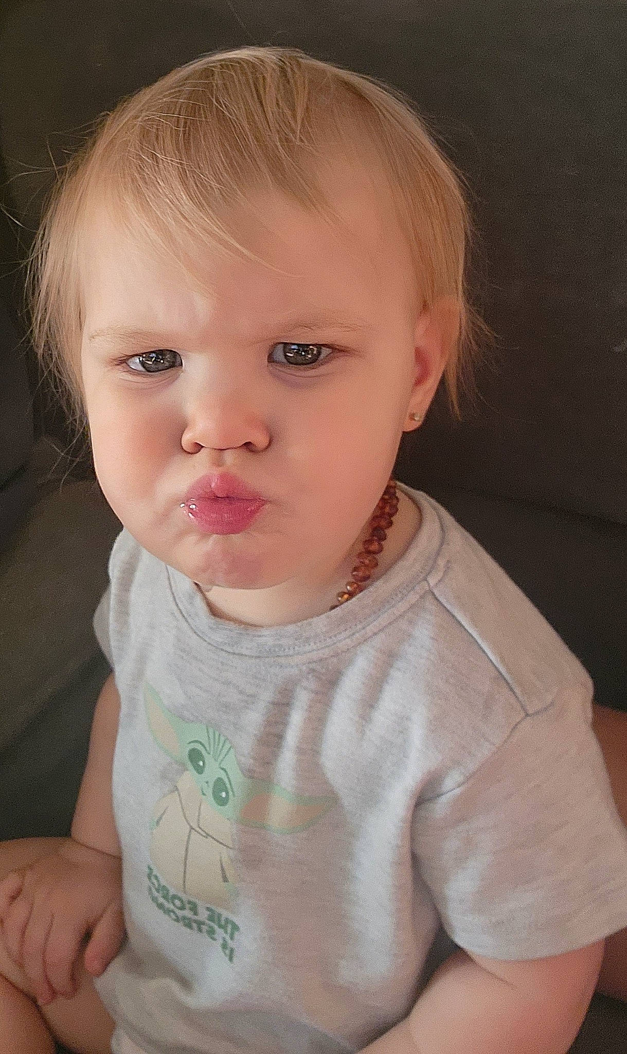 Sophie is registered to the contest to win money with this photo: baby, baby_toddler_clothing, cheek, chin, close_up, dress, ear, eye, eyebrow, eyelash, human_body, iris, lip, mouth, neck, nose, person, skin, sleeve, t_shirt