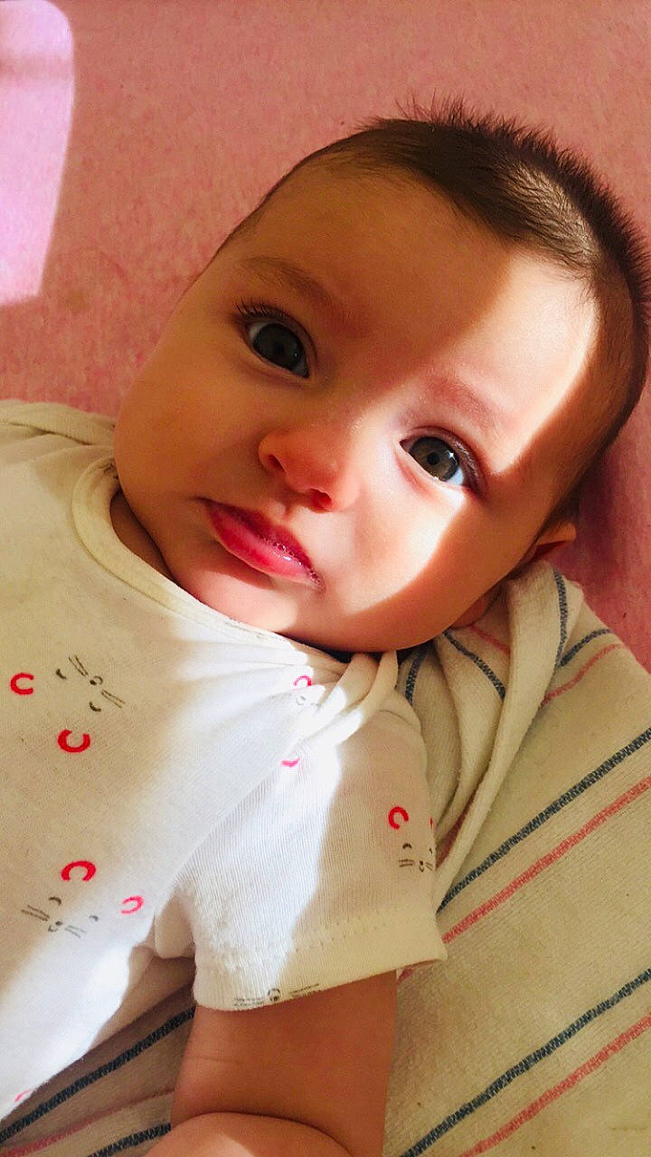 Leni is registered to the contest to win money with this photo: baby, beauty, cheek, child, chin, eye, eyebrow, eyelash, face, forehead, head, lip, mouth, neck, nose, person, pink, skin, toddler