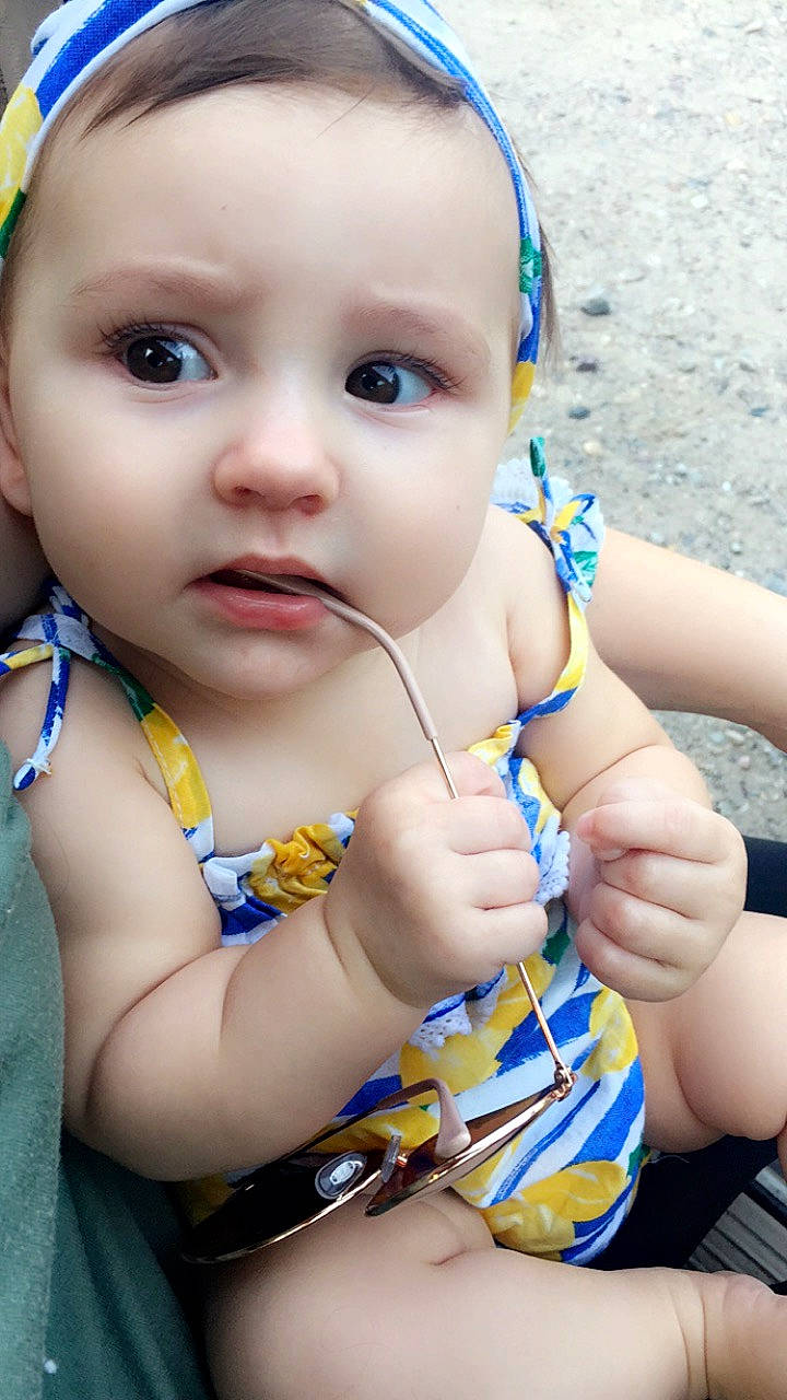 Leni is registered to the contest to win money with this photo: baby, baby_products, cheek, child, eye, face, person, skin, smile, toddler