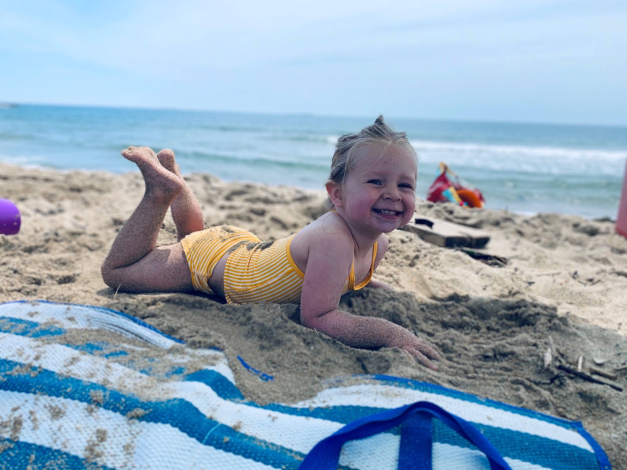 Myah joined the competition — help win amazing prizes! beach, child, coast, fun, holiday, joy, leg, leisure, linens, ocean, person, play, recreation, sand, sea, sky, summer, sun_tanning, toddler, tourism