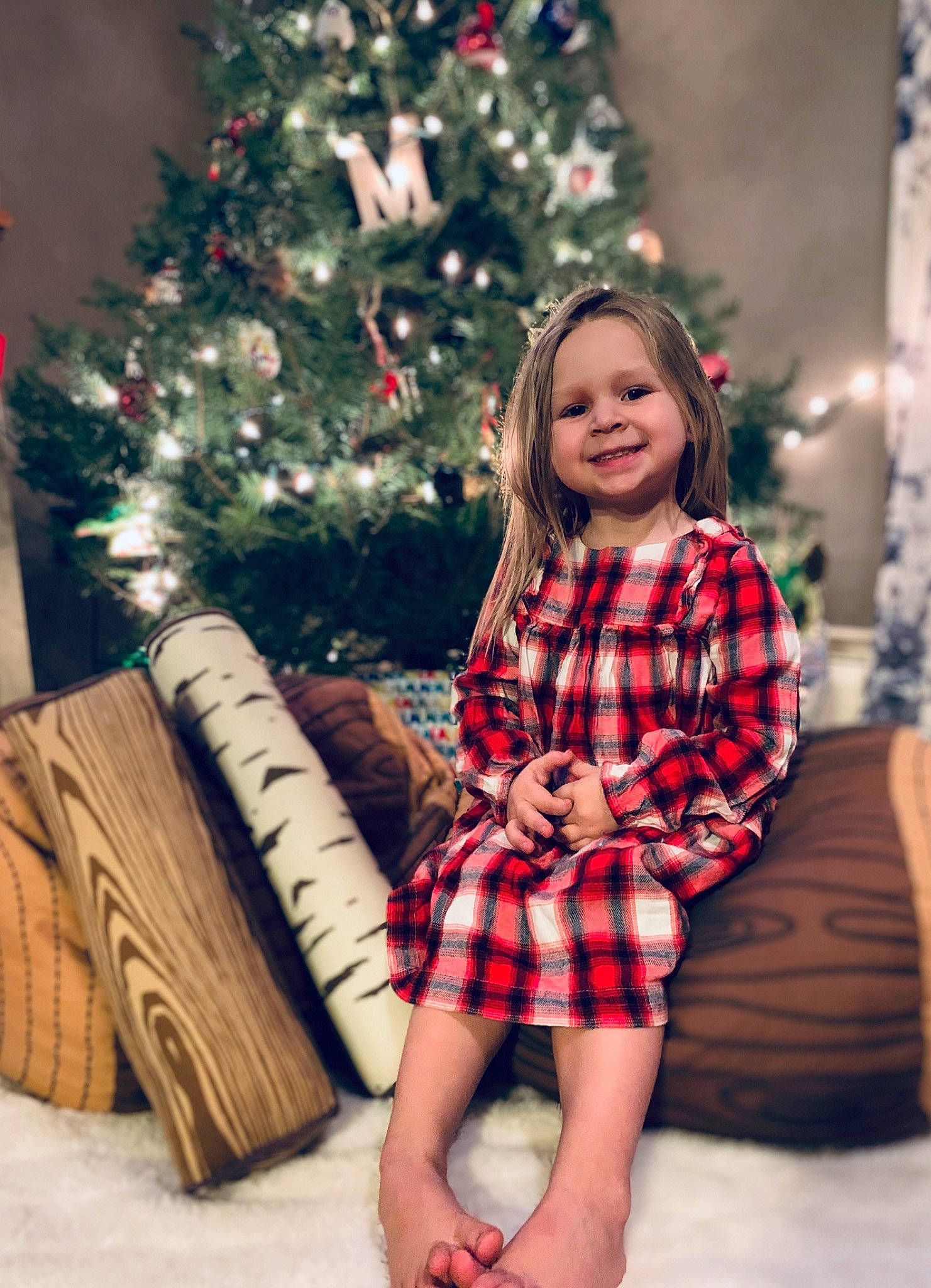 Myah joined the competition — help win amazing prizes! blond, child, child_model, christmas, christmas_decoration, christmas_eve, christmas_tree, design, fir, happy, holiday, joy, leg, long_hair, pattern, person, plaid, sitting, smile, tartan