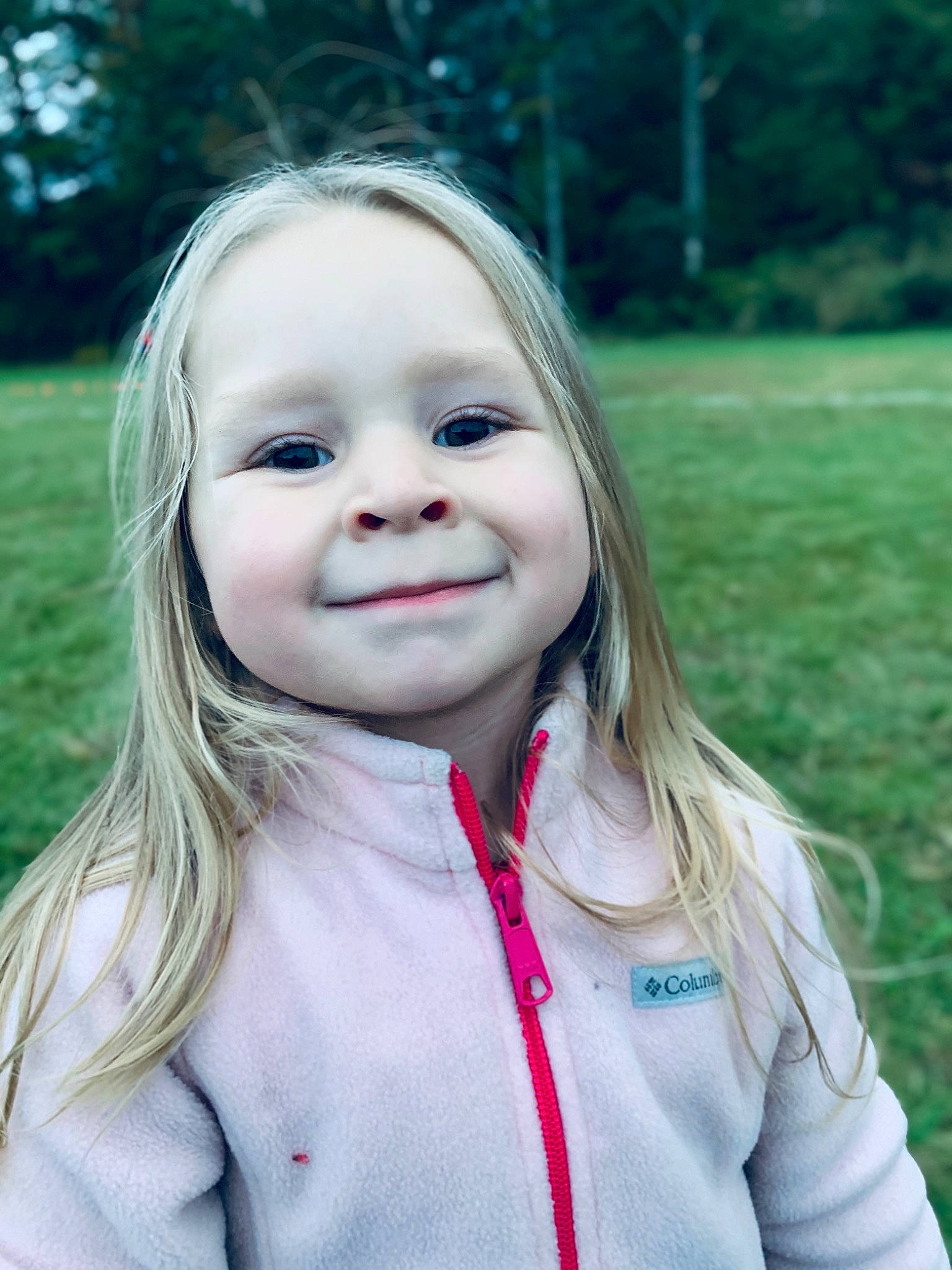Myah joined the competition — help win amazing prizes! blond, cheek, child, child_model, eye, face, facial_expression, fun, grass, hair, happy, head, joy, lip, people, person, photography, pink, skin, smile