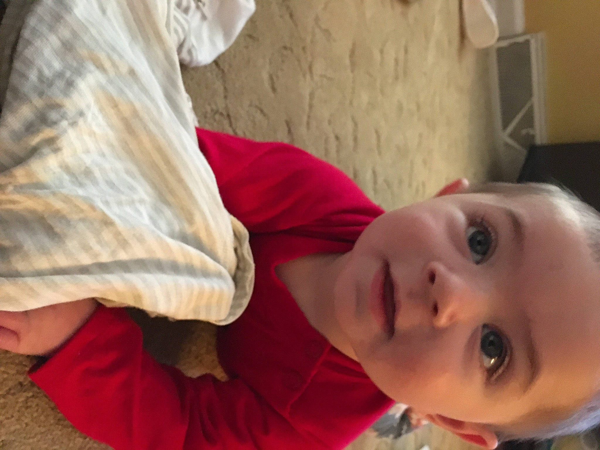 Ryker joined the competition — help win amazing prizes! baby, child, chin, comfort, elbow, eyelash, flooring, fun, happy, human_body, human_leg, linens, mouth, neck, nose, person, room, skin, smile, toddler