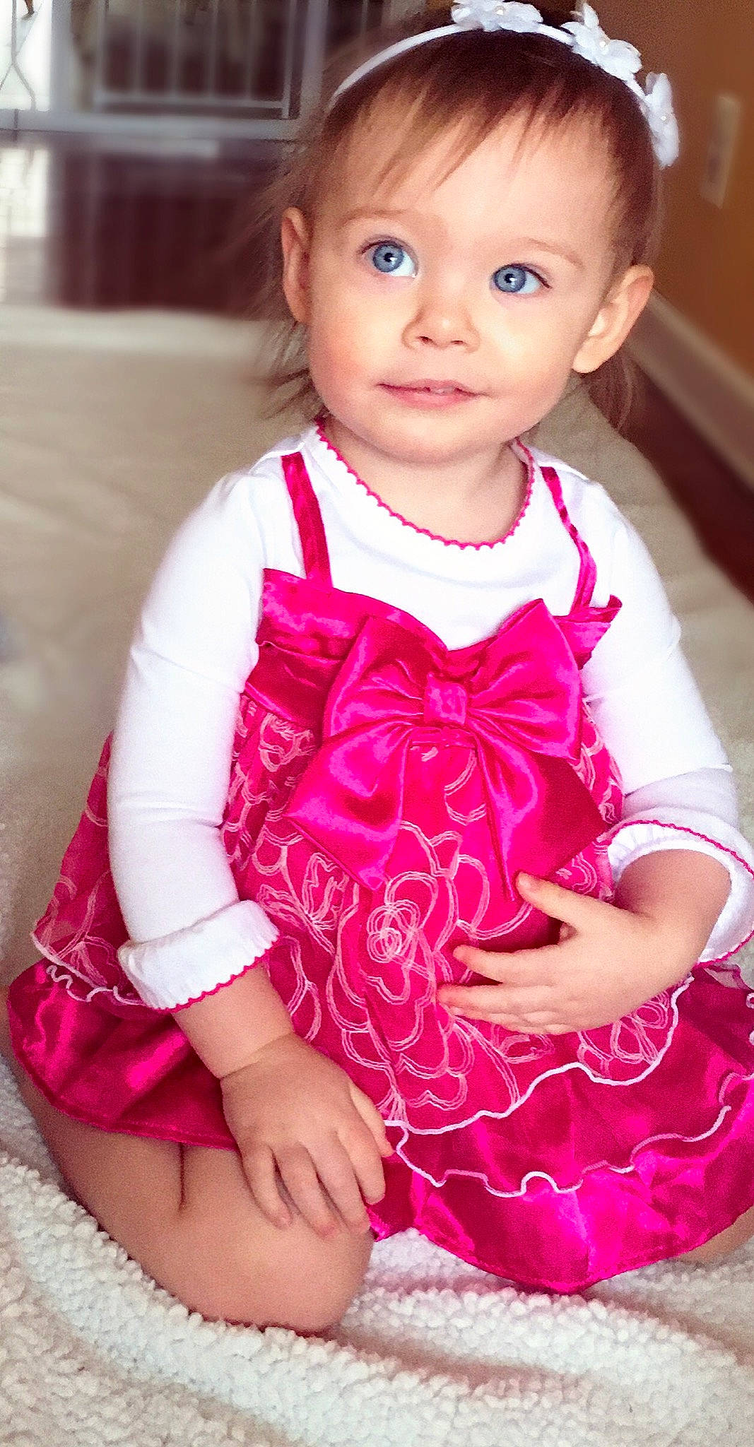 Gemma is registered to the contest to win money with this photo: baby_toddler_clothing, blue, cheek, dress, embellishment, face, happy, head, iris, magenta, one_piece_garment, person, pink, purple, red, skin, sleeve, smile, toddler, white