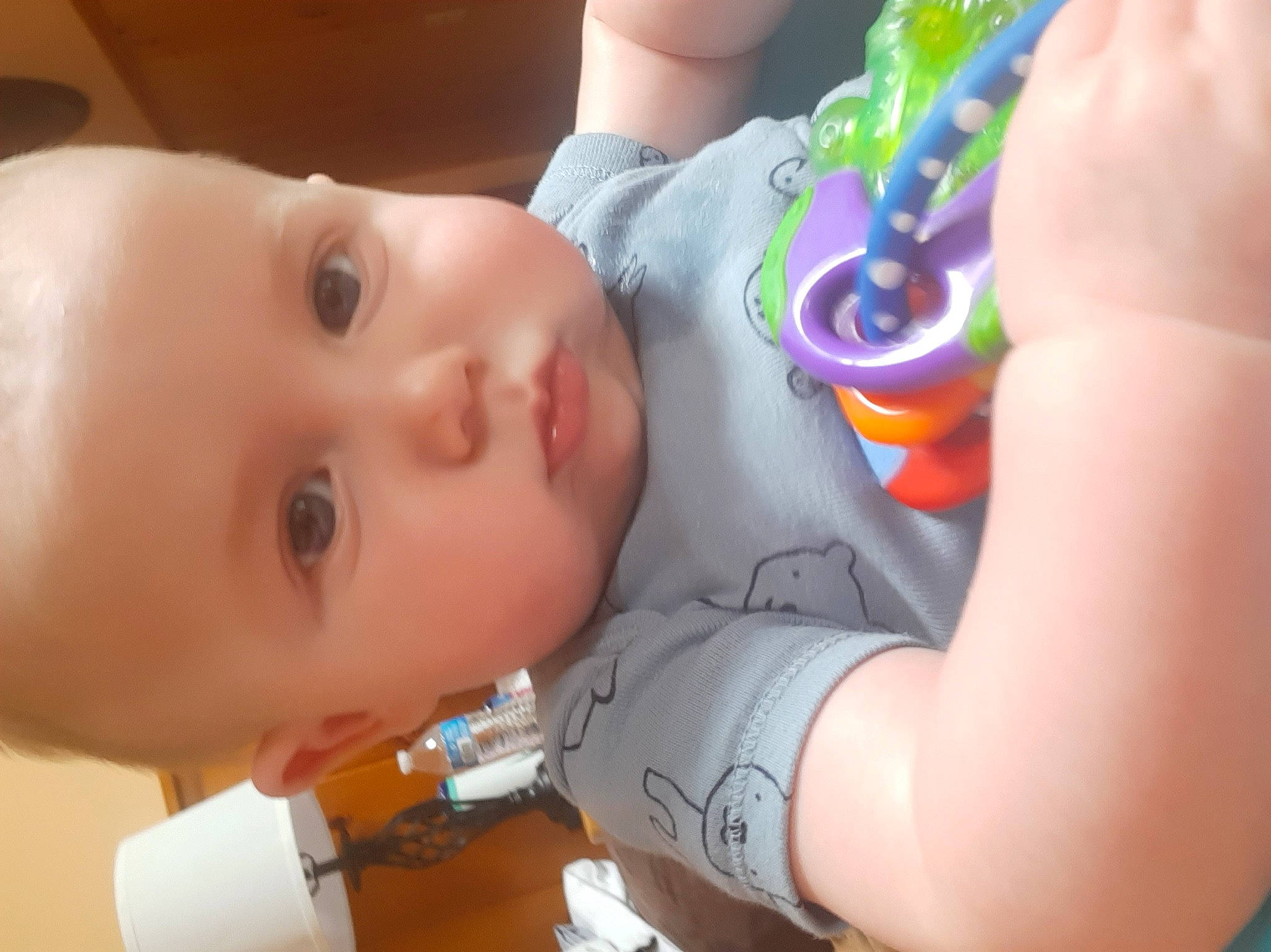 Bradyn is registered to the contest to win money with this photo: baby, baby_toddler_clothing, cheek, drinkware, ear, eyebrow, eyelash, facial_expression, finger, hand, human_body, iris, lip, mouth, muscle, neck, nose, person, plastic_bottle, product