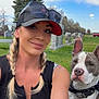 Odin Jones joined the competition — help win amazing prizes! woman, dog, selfie, outdoor, grass, tree, sky, cap, braids, pet, bandana, smile, casual, portrait, daytime, cemetery, headwear, animal, leash, nature