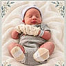 baby, newborn, sleeping, portrait, indoors, blanket, soft_blanket, hat, striped_hat, mittens, gray_clothing, overalls, polka_dots, baby_feet, socks, cuddly, peaceful, floral_border, decorative_frame, closeup