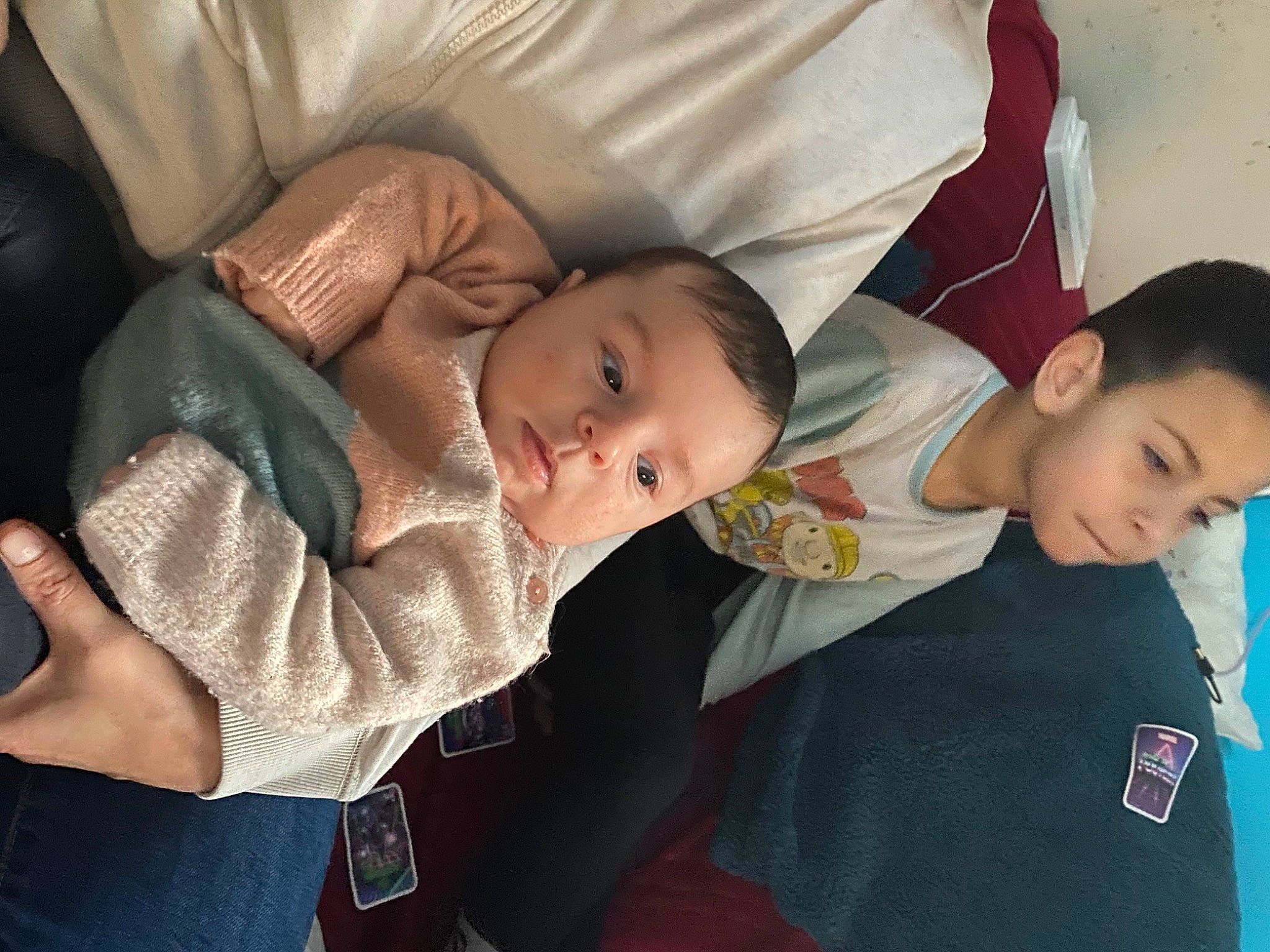 Rebecca participe au concours pour gagner de l'argent avec cette photo : baby, baby_products, cheek, child, comfort, fun, gesture, happy, lap, nose, person, room, sitting, smile, toddler, tree