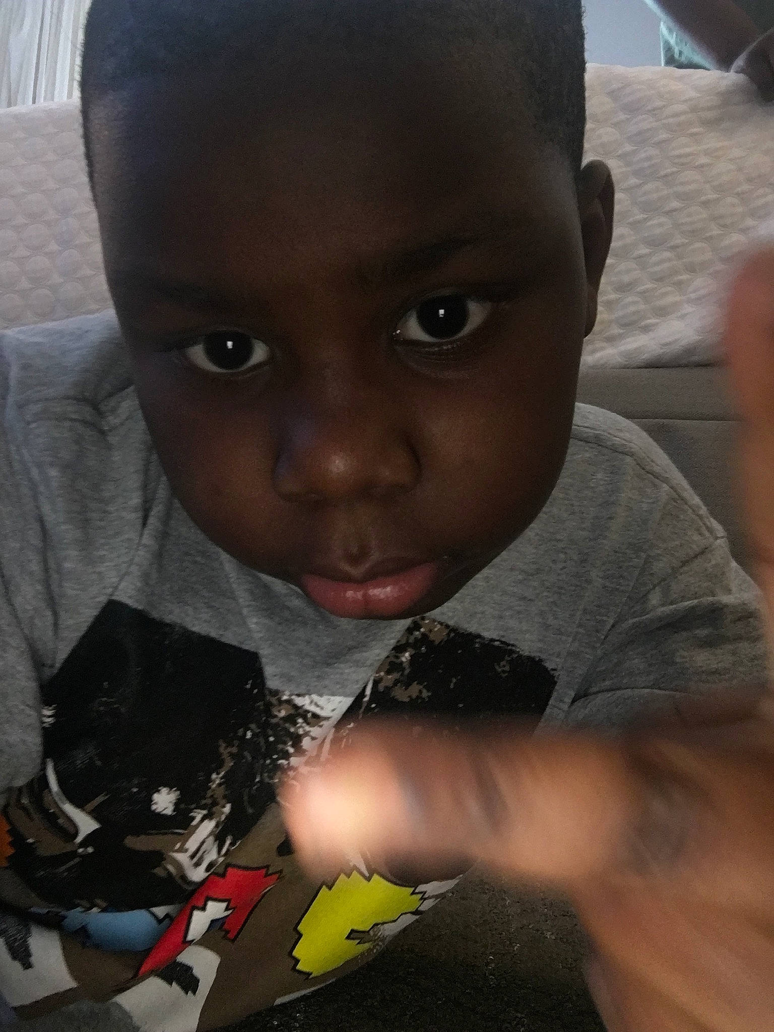 Darian joined the competition — help win amazing prizes! baby, black_hair, carmine, child, cool, finger, forehead, fun, gadget, happy, iris, mouth, nail, nose, person, photography, sitting, skin, t_shirt, toddler