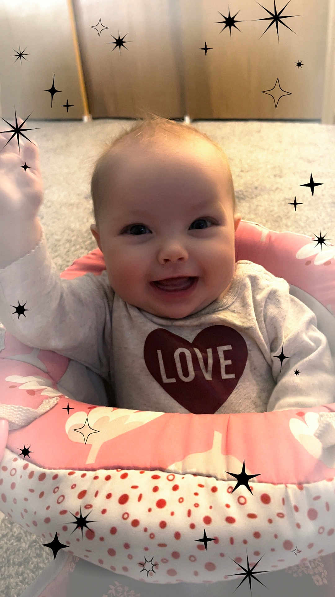 Rowen joined the competition — help win amazing prizes! baby, infant, child, smiling, happy, pink, heart, onesie, seat, bouncer, sparkles, filter_overlay, carpet, indoor, portrait, cheeks, eyes, cute, playtime, smile
