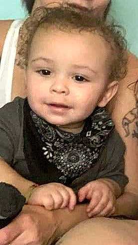 Jordan is registered to the contest to win money with this photo: baby, baby_toddler_clothing, cheek, comfort, eye, eyebrow, eyelash, face, finger, gesture, happy, iris, mouth, nose, organ, people, person, skin, sleeve, smile