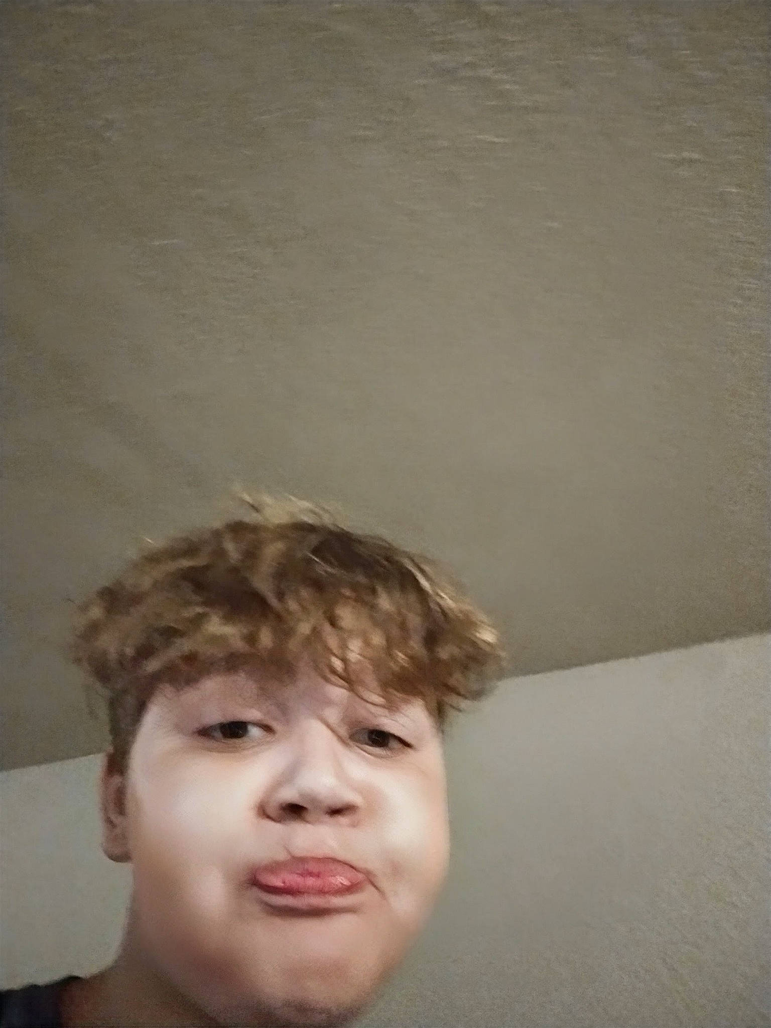 Bryce is registered to the contest to win money with this photo: bangs, brown_hair, ceiling, cheek, child, crop, eyelash, flash_photography, flesh, forehead, fun, happy, jaw, no_expression, paint, person, plaster, portrait_photography, room, surfer_hair