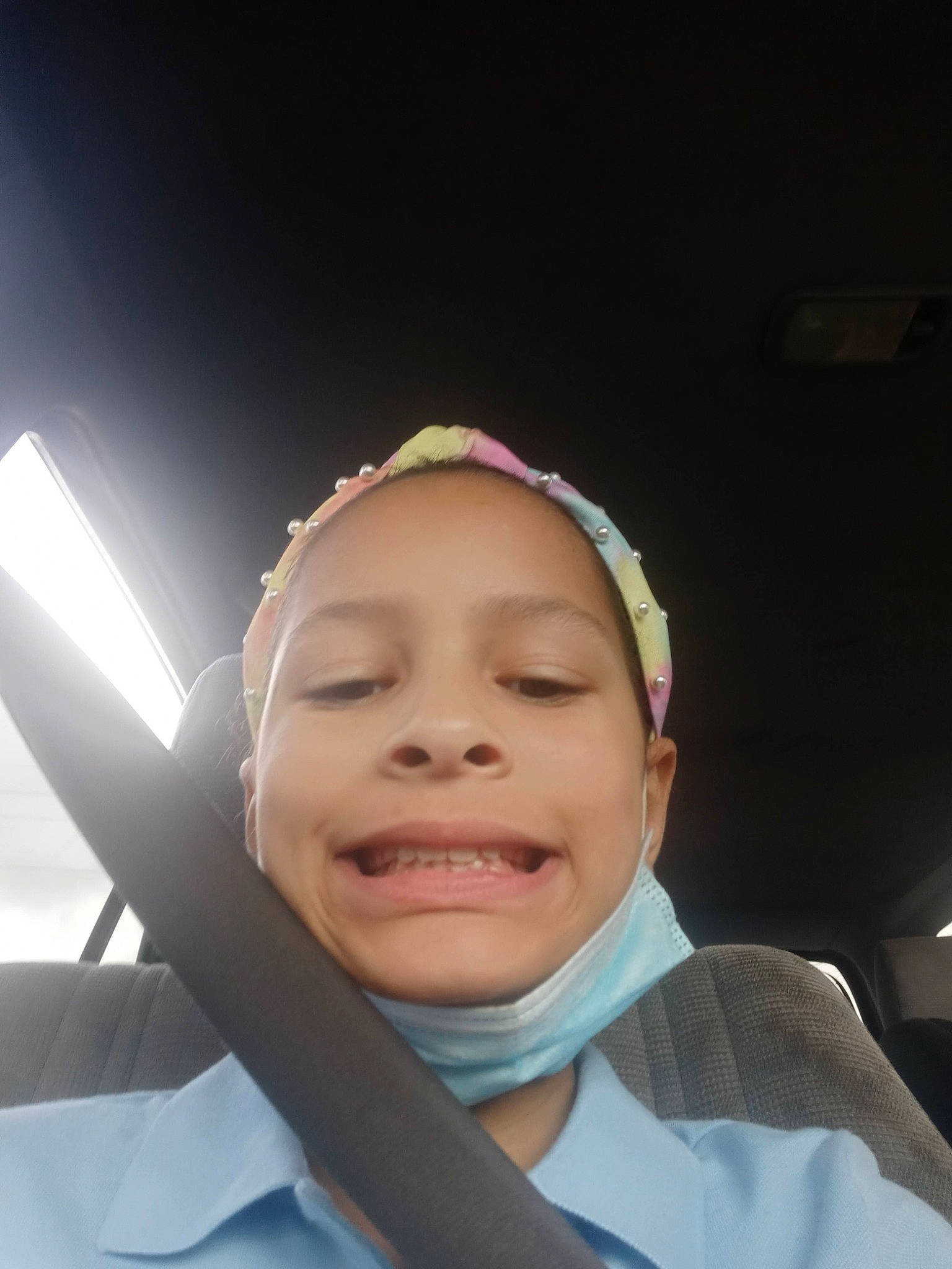 Ashari is registered to the contest to win money with this photo: auto_part, automotive_window_part, car_seat, child, driving, eye, fashion_accessory, flash_photography, fun, gesture, happy, hoodie, human_body, joy, laugh, person, personal_protective_equipment, portrait_photography, selfie, smile