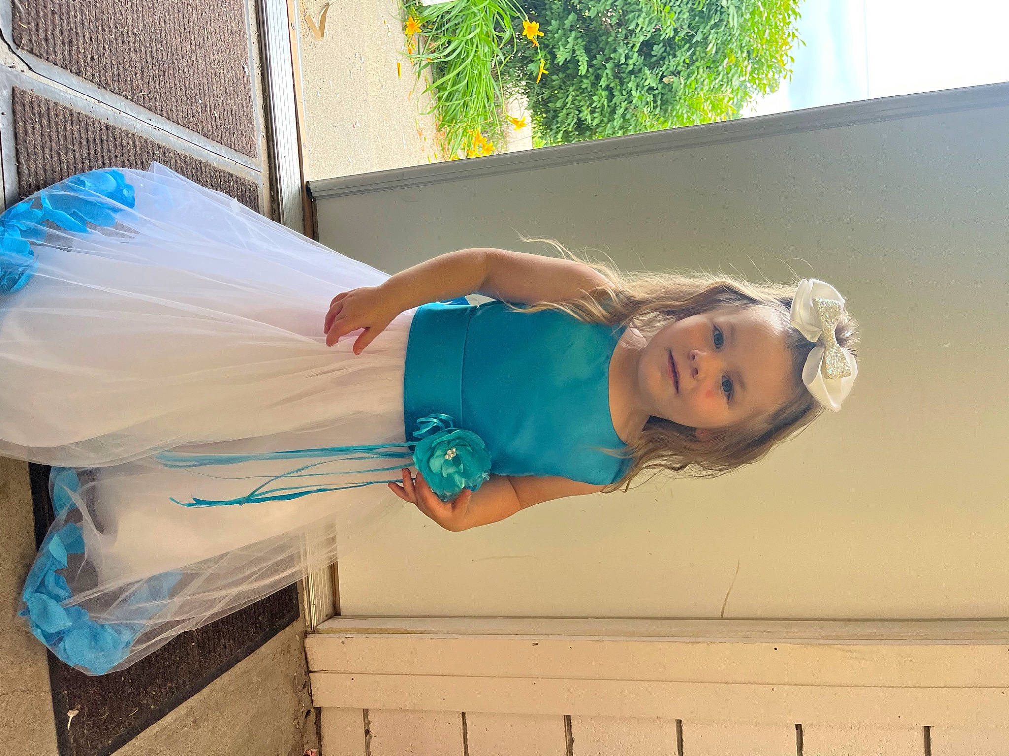 Kalliopë joined the competition — help win amazing prizes! baby, baby_toddler_clothing, child, dress, electric_blue, event, fun, happy, leisure, person, plant, sitting, smile, toddler, tree, vacation