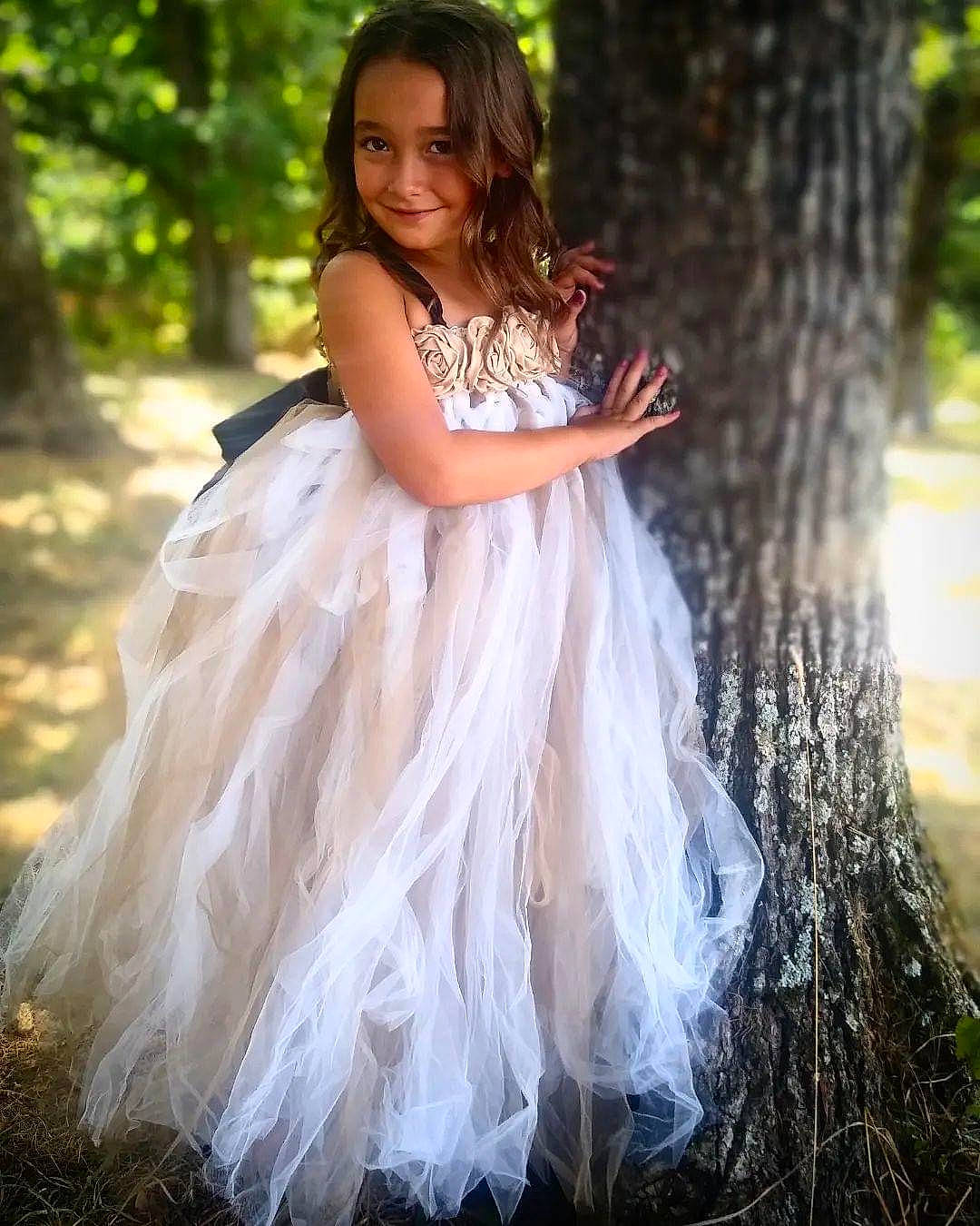 Nevaeh joined the competition — help win amazing prizes! arm, bridal_clothing, bridal_party_dress, dress, eye, face, flash_photography, gown, grass, hair, hand, happy, head, human_body, joy, leg, people_in_nature, person, plant, smile
