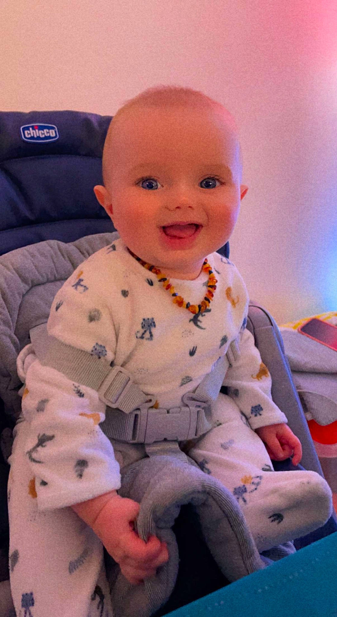 Gabyn participe au concours pour gagner de l'argent avec cette photo : baby, baby_toddler_clothing, cheek, child, comfort, facial_expression, fun, happy, leg, lip, mouth, nose, person, pink, product, purple, sitting, skin, sleeve, smile