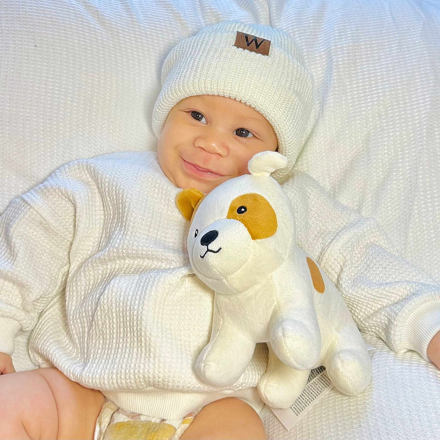 Zayn joined the competition — help win amazing prizes! baby, bed, blanket, bodypart, bonnet, cap, clothing, face, finger, furniture, hand, happy, hat, head, newborn, person, photography, portrait, smile, toy