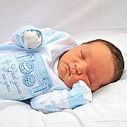 Alegend joined the competition — help win amazing prizes! newborn, baby, sleeping, infant, blue_clothing, white_blanket, cute, peaceful, soft_texture, portrait, child, indoors, cozy, resting, closeup, sleep, small_hands, face, cute_outfit, serene