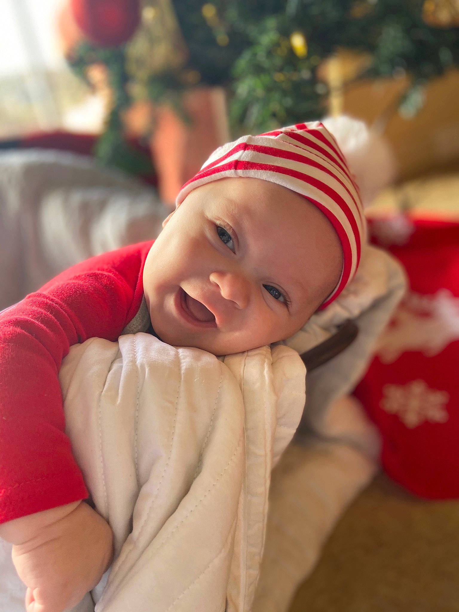 Kye joined the competition — help win amazing prizes! baby, cheek, child, christmas, christmas_eve, face, fictional_character, happy, head, headgear, holiday, person, red, skin, smile, toddler, tree