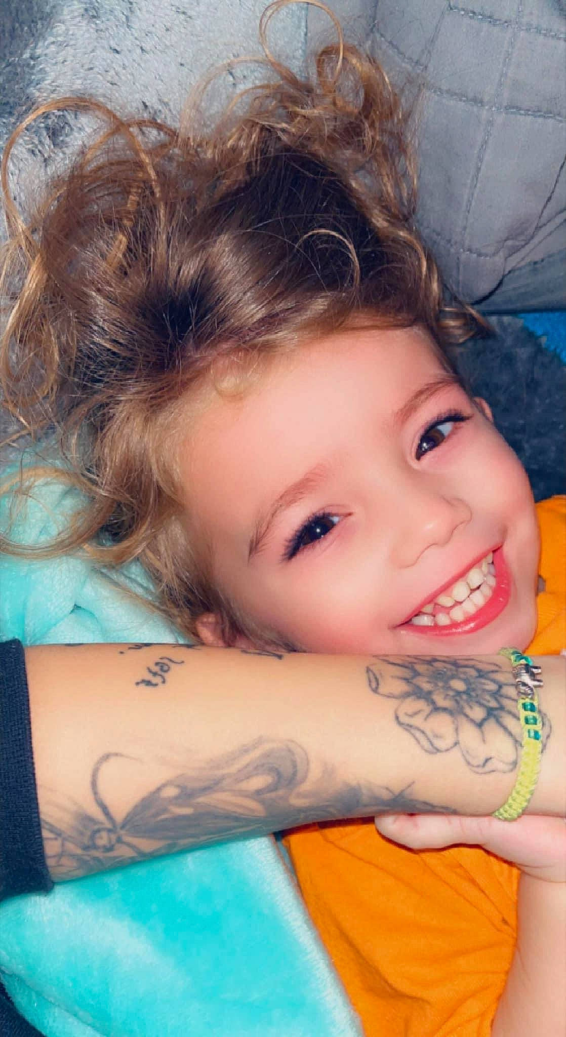 Bellamy is registered to the contest to win money with this photo: arm, blue, chin, eye, eyebrow, eyelash, face, hairstyle, happy, iris, joint, joy, lip, mouth, muscle, neck, nose, organ, person, shoulder