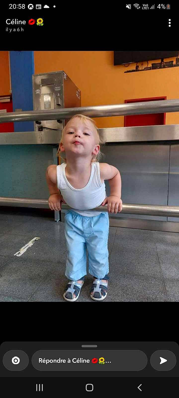 Ezekyel participe au concours pour gagner de l'argent avec cette photo : baby_toddler_clothing, balance, child, elbow, flash_photography, floor, flooring, fun, gesture, happy, human_body, human_leg, joint, leisure, person, sitting, standing, t_shirt, thumb, toddler