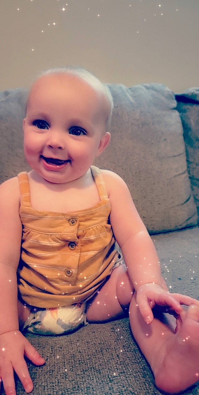 Emalynn joined the competition — help win amazing prizes! arm, baby, baby_toddler_clothing, cheek, chin, eye, finger, flash_photography, happy, head, human_body, iris, joy, lip, mouth, nose, person, pink, purple, skin