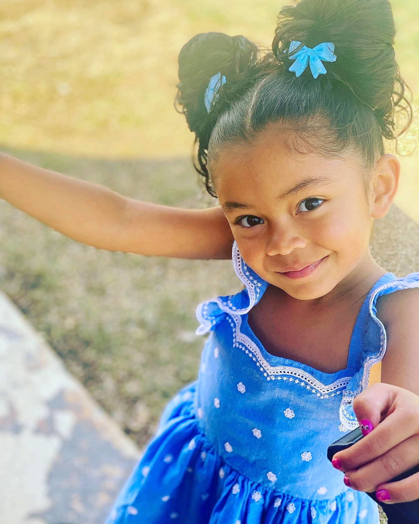 Zoe is registered to the contest to win money with this photo: aqua, azure, baby_toddler_clothing, blue, clothing, day_dress, dress, eye, flash_photography, grass, hair, happy, iris, joy, one_piece_garment, person, shoulder, skin, smile, standing