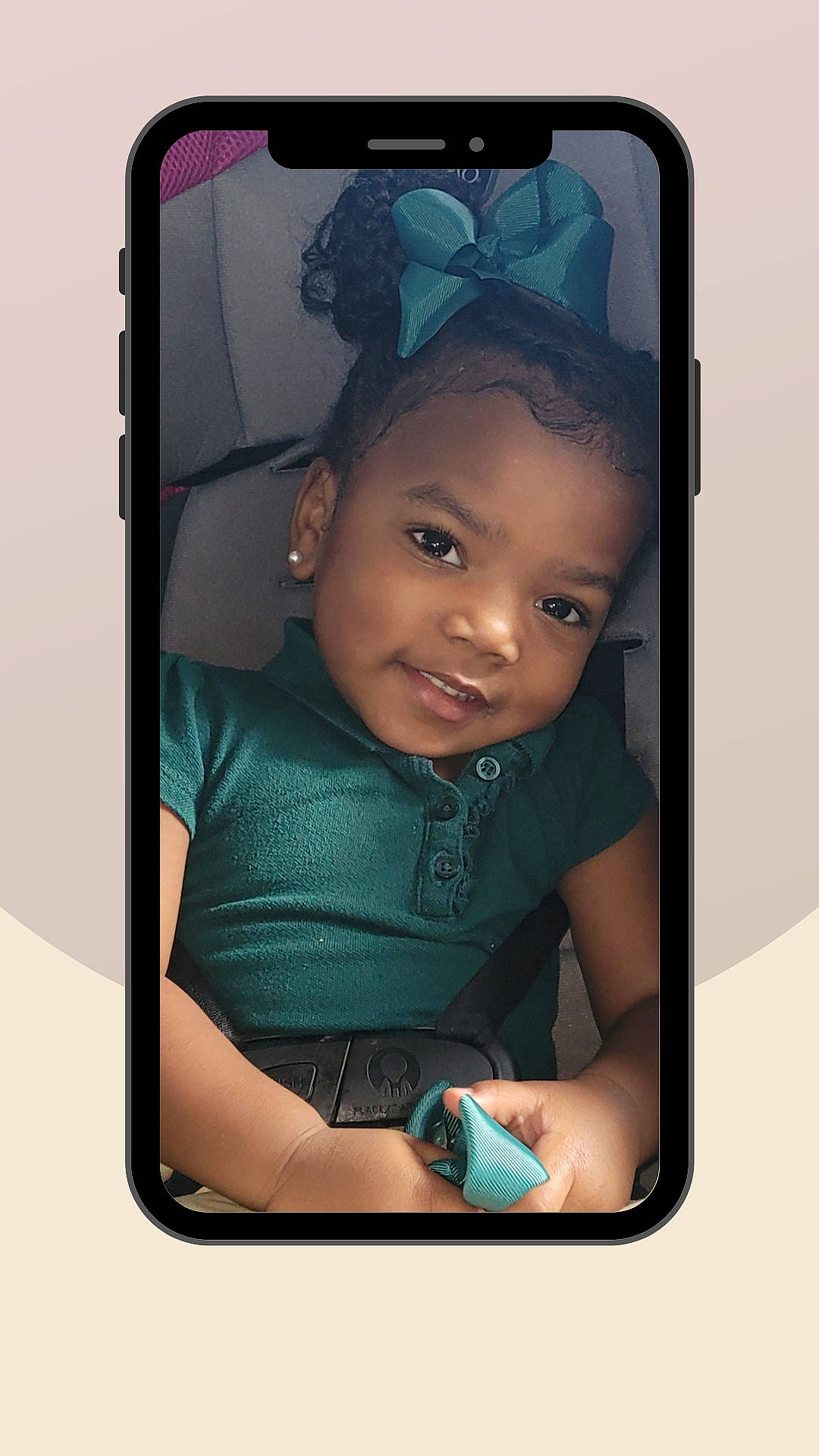 Carlei is registered to the contest to win money with this photo: baby, cameras_optics, child, communication_device, display_device, electronic_device, flash_photography, gadget, gesture, happy, magenta, material_property, metal, multimedia, output_device, person, portable_communications_device, smile, technology, toddler