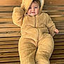 autumn, baby, babywear, bench, child, clothing, cozy, cute, fall, fur, happy, hood, leaves, onesie, outdoor, person, portrait, seasonal, smile, wood