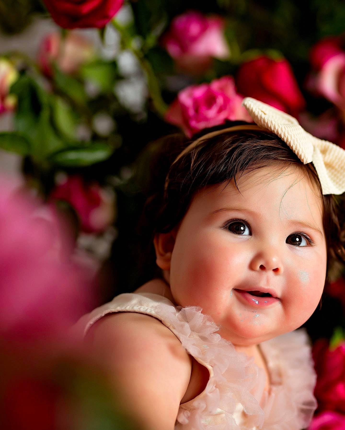 Everleigh joined the competition — help win amazing prizes! baby_toddler_clothing, cheek, dress, eye, eyelash, flower, grass, happy, head, headgear, headpiece, lip, people_in_nature, person, petal, photograph, pink, plant, skin, smile