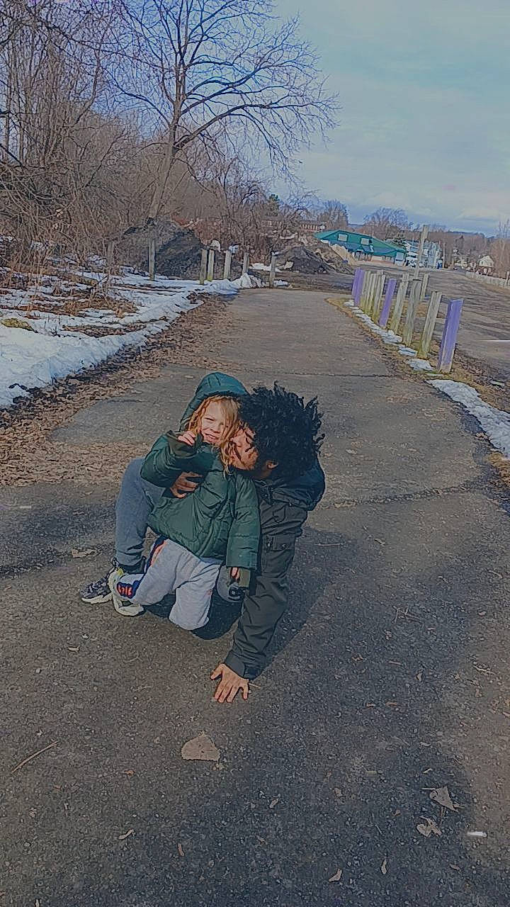 Bently joined the competition — help win amazing prizes! asphalt, freezing, fun, grass, landscape, leisure, people_in_nature, person, plant, road, road_surface, rock, shadow, sitting, sky, soil, travel, tree, winter