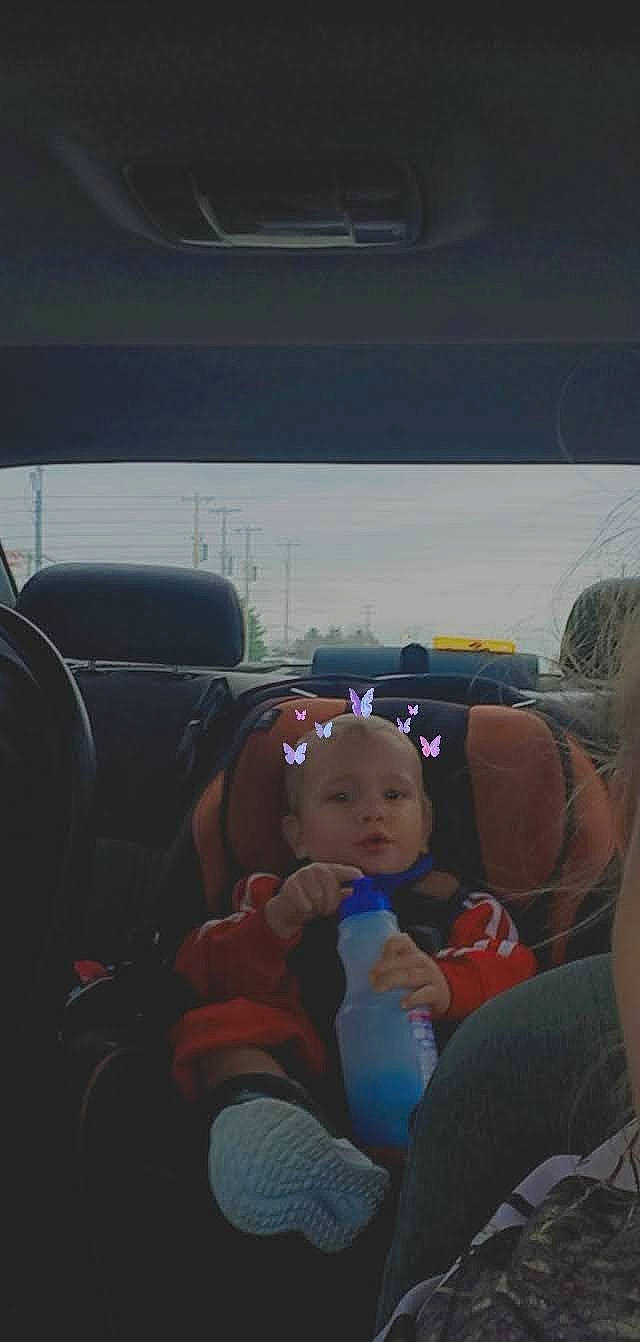Brayden is registered to the contest to win money with this photo: auto_part, automotive_design, automotive_exterior, automotive_mirror, automotive_window_part, baby, car, car_seat, family_car, hat, head_restraint, motor_vehicle, passenger, person, personal_luxury_car, sky, steering_wheel, toddler, vehicle, vehicle_door