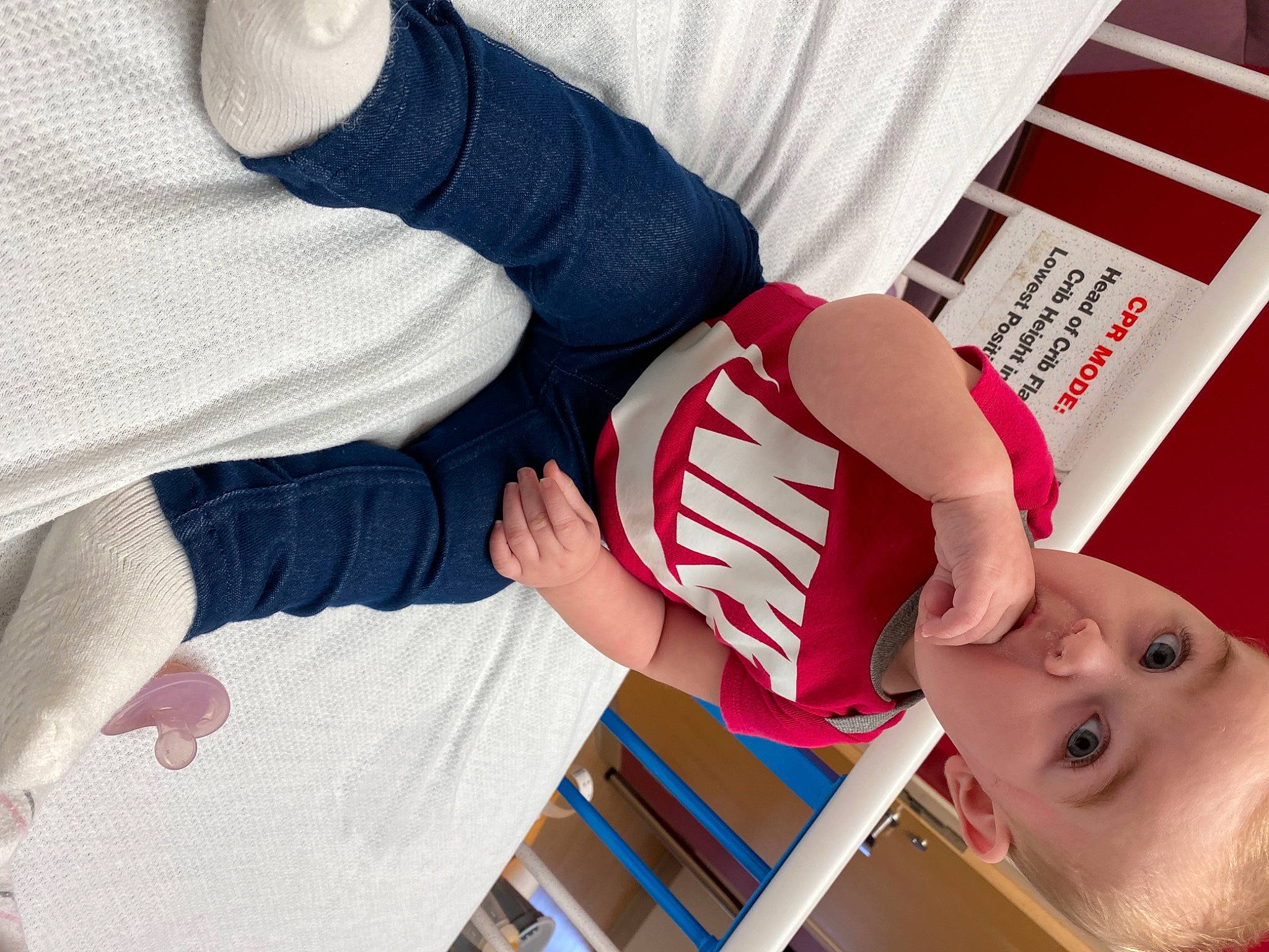 Brinleigh is registered to the contest to win money with this photo: arm, carmine, child, comfort, elbow, finger, foot, gesture, hand, human_leg, joint, knee, leg, nail, person, sleeve, surprise, textile, thigh, thumb