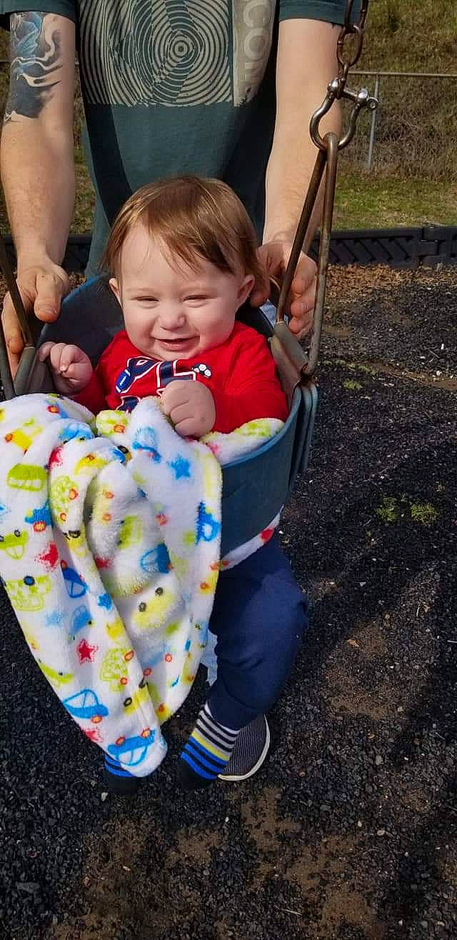 Tylin is registered to the contest to win money with this photo: baby, baby_carriage, baby_products, child, person, play, product, swing, toddler