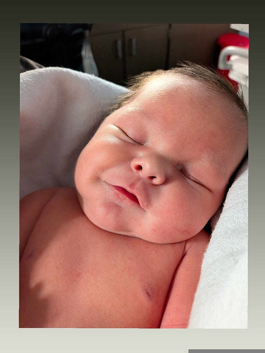 Elijah is registered to the contest to win money with this photo: newborn, baby, sleeping, face, skin, blanket, infant, peaceful, closeup, portrait, soft_light, cute, child, human, relaxation, indoors, rest, toddler, head, expression