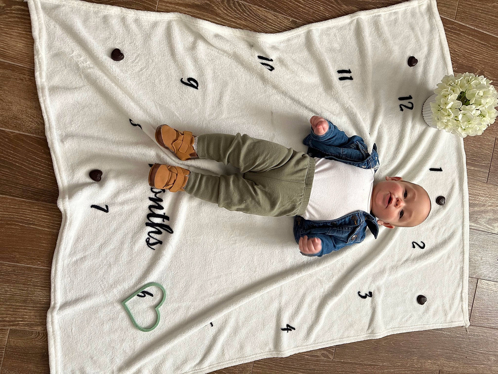 Jameson is registered to the contest to win money with this photo: baby, baby_toddler_clothing, bedding, button, child, collar, comfort, dress_shirt, font, linens, pattern, person, room, sleeve, sportswear, t_shirt, textile, tie, toddler, uniform
