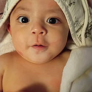 Ethan joined the competition — help win amazing prizes! baby, closeup, face, eyes, towel, hood, skin, infant, cute, child, portrait, expression, indoors, newborn, soft, blanket, person, warmth, adorable, curious