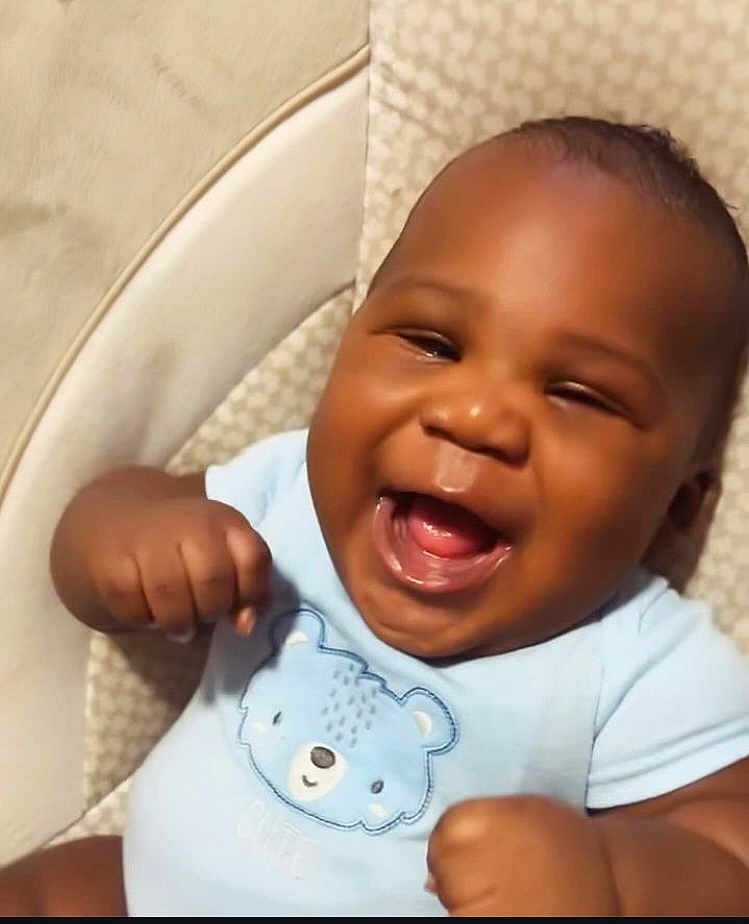 Masai' is registered to the contest to win money with this photo: baby, babylaughing, face, happy, head, laughing, person