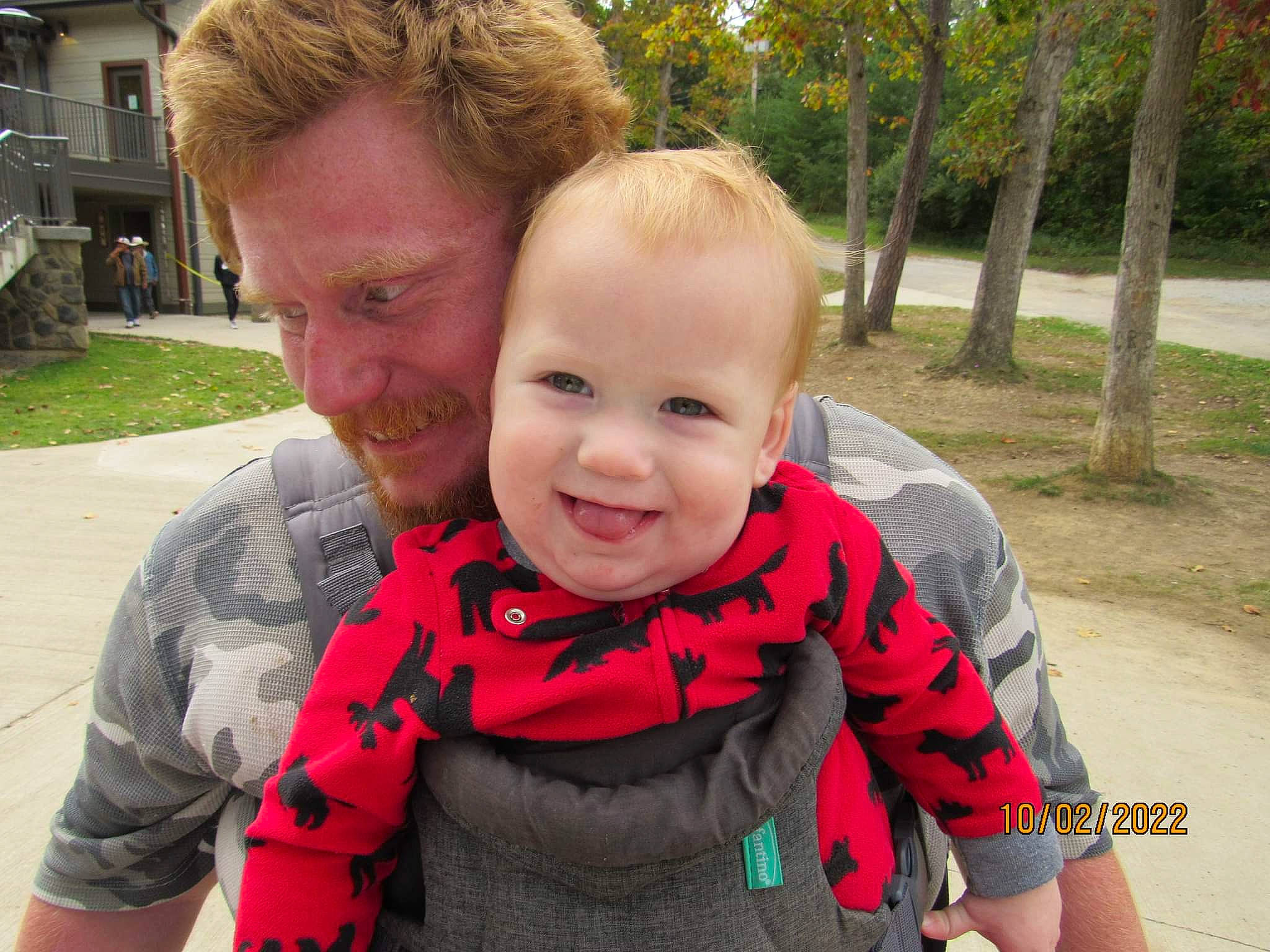 Hayden is registered to the contest to win money with this photo: baby, baby_toddler_clothing, eye, fun, grass, hair, hairstyle, happy, interaction, iris, joy, leaf, leisure, nose, person, plant, skin, sleeve, smile, t_shirt